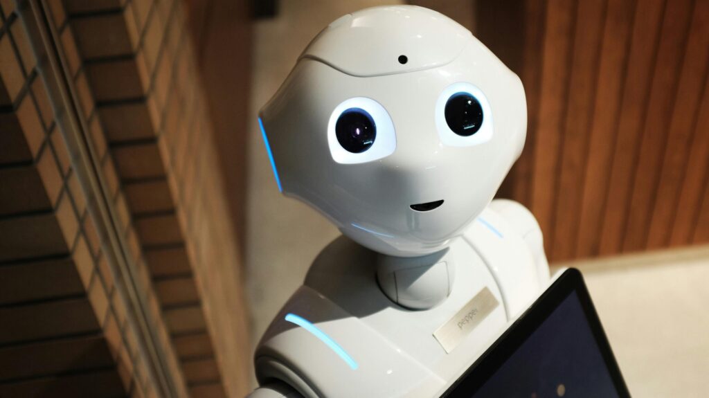 A futuristic humanoid robot in an indoor Tokyo setting, showcasing modern technology.